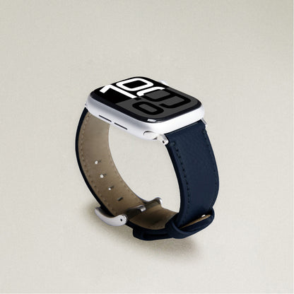 Labovarde Apple Watch band in Navy — angled view showing the beige lining and silver buckle