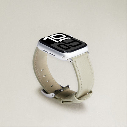 Labovarde Apple Watch band in Sand Gray — angled view showing the beige lining and silver buckle