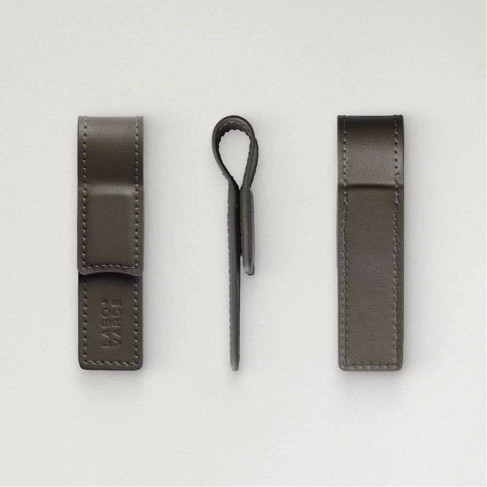 Labovarde Book Clip in Etoupe — Multi-angle studio shot showing the front with debossed logo, side profile, and back views