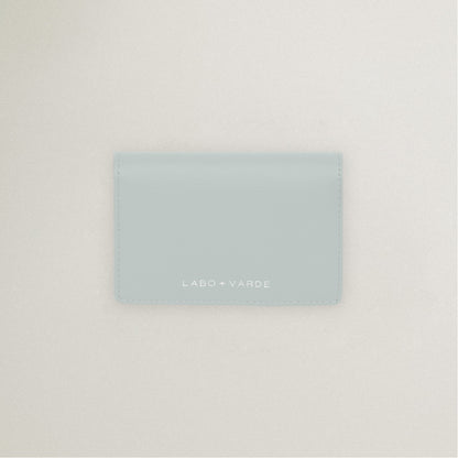 Labovarde Business Card Holder in Clear Blue — Top-down view showing the silver debossed logo
