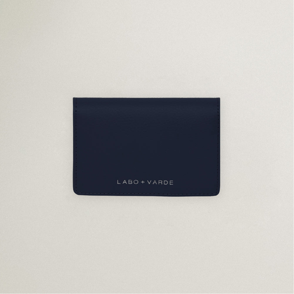 Labovarde Business Card Holder in Navy — Top-down view showing the silver debossed logo