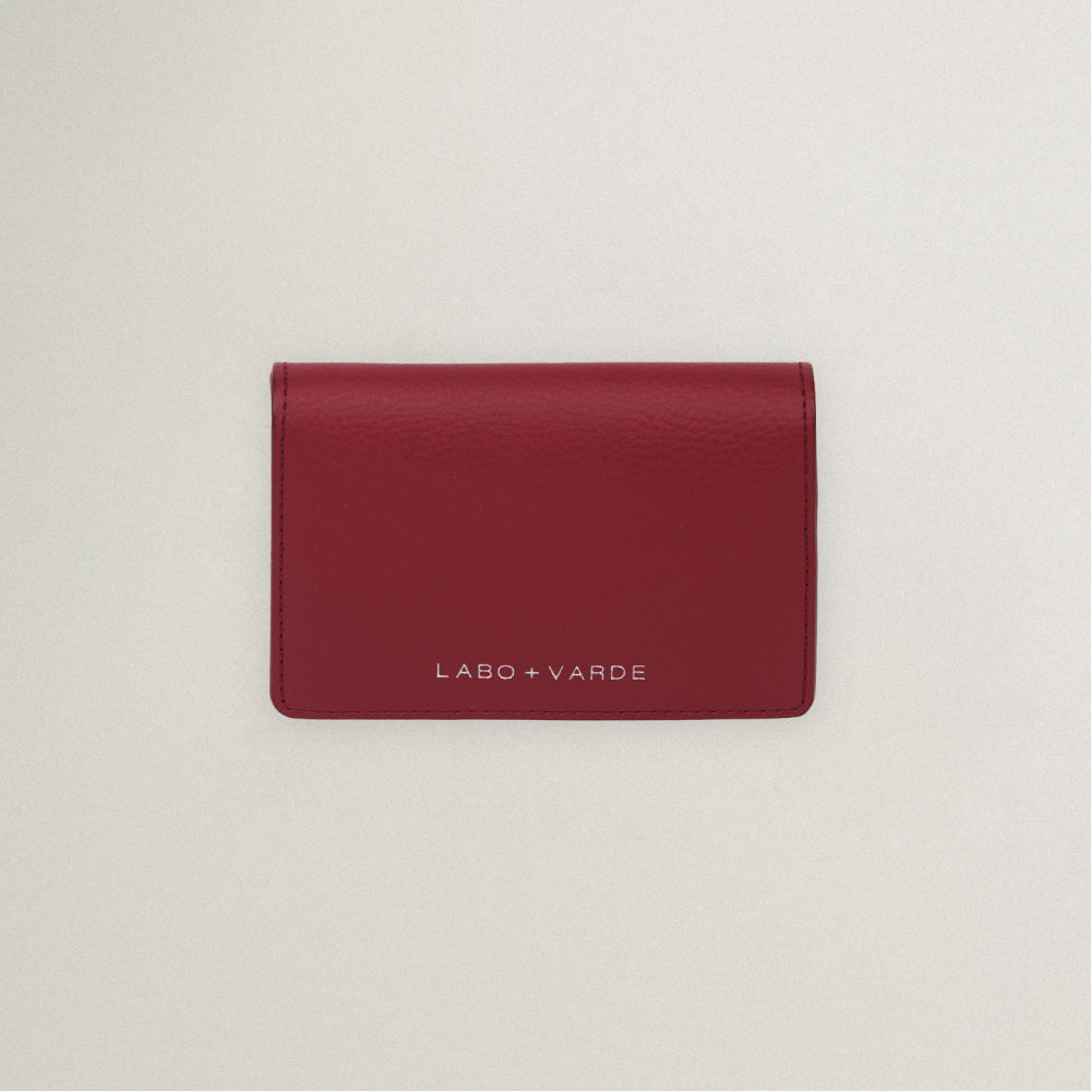 Labovarde Business Card Holder in Red — Top-down view showing the silver debossed logo