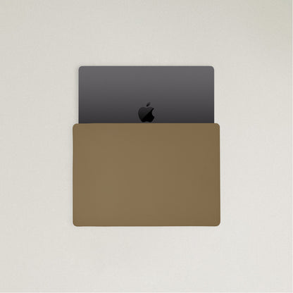Labovarde Laptop Sleeve in Camel Brown — Top view with a space gray MacBook partially inserted to show the sleek fit