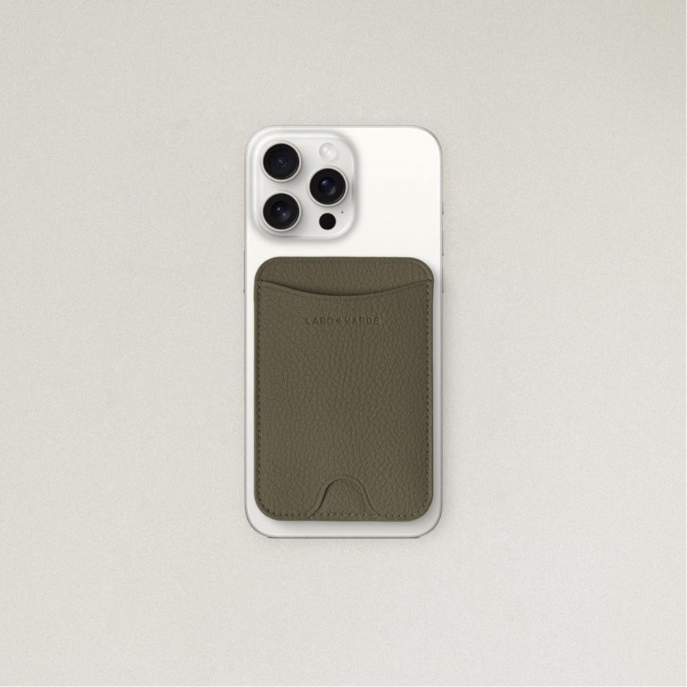 Labovarde MagSafe Card Wallet in Etoupe — Attached to a white iPhone, showing the magenetic fit and debossed logo