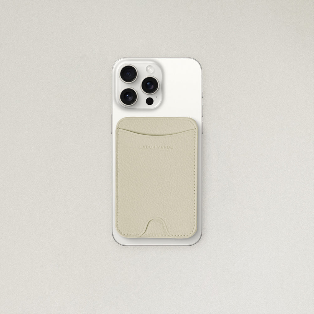 Labovarde MagSafe Card Wallet in Sand Gray — Attached to a white iPhone, showing the magenetic fit and debossed logo