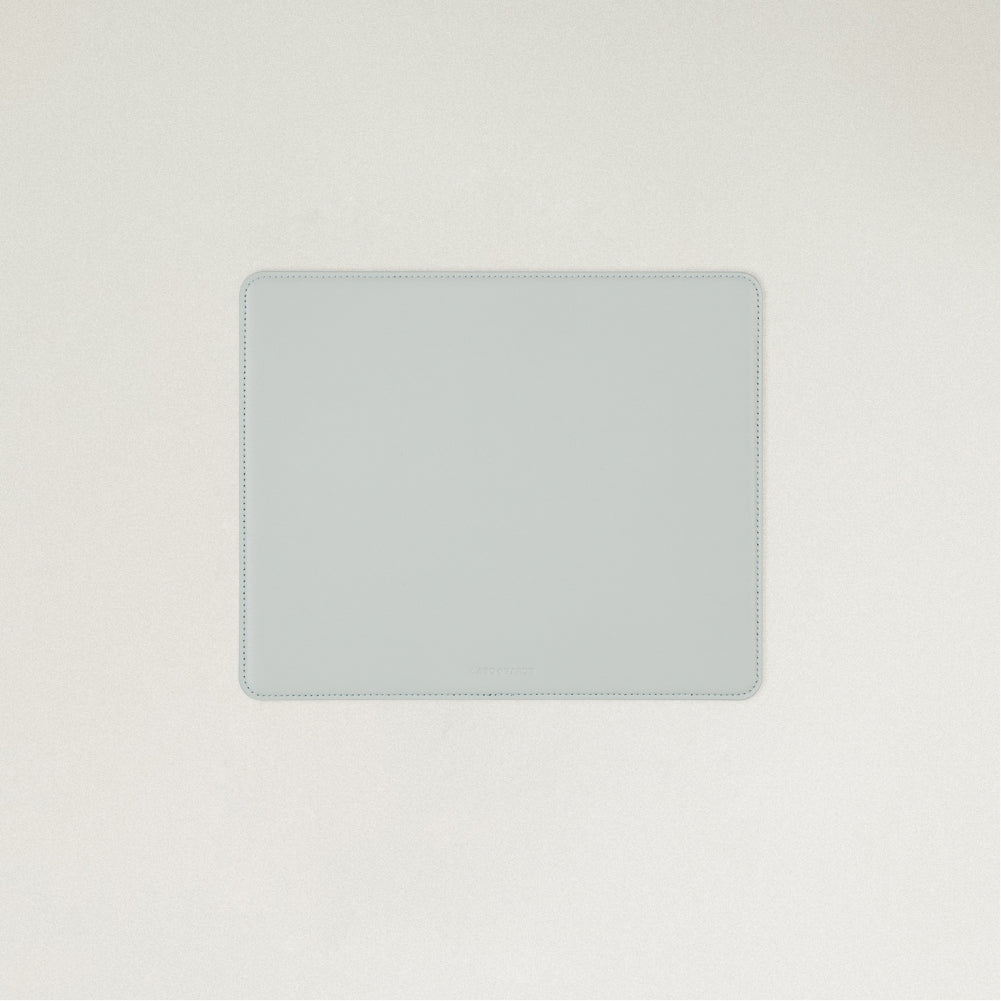 Labovarde Mouse Pad in Clear Blue — Flat lay view of the mouse pad centered on a light gray background