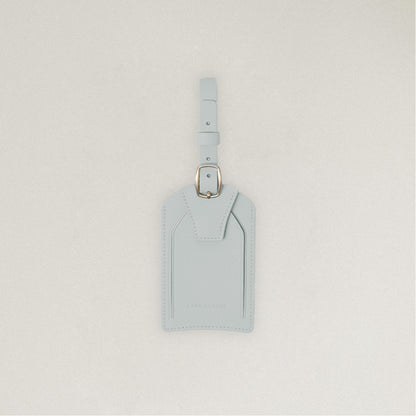 Labovarde Name Tag in Clear Blue — Front view centered on a minimalist textured white background