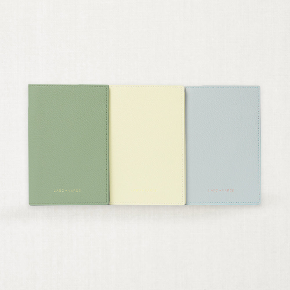Labovarde Passport Case — front view of 3 Colors showing Sage Green, Light Yellow and Clear Blue options on a white Background
