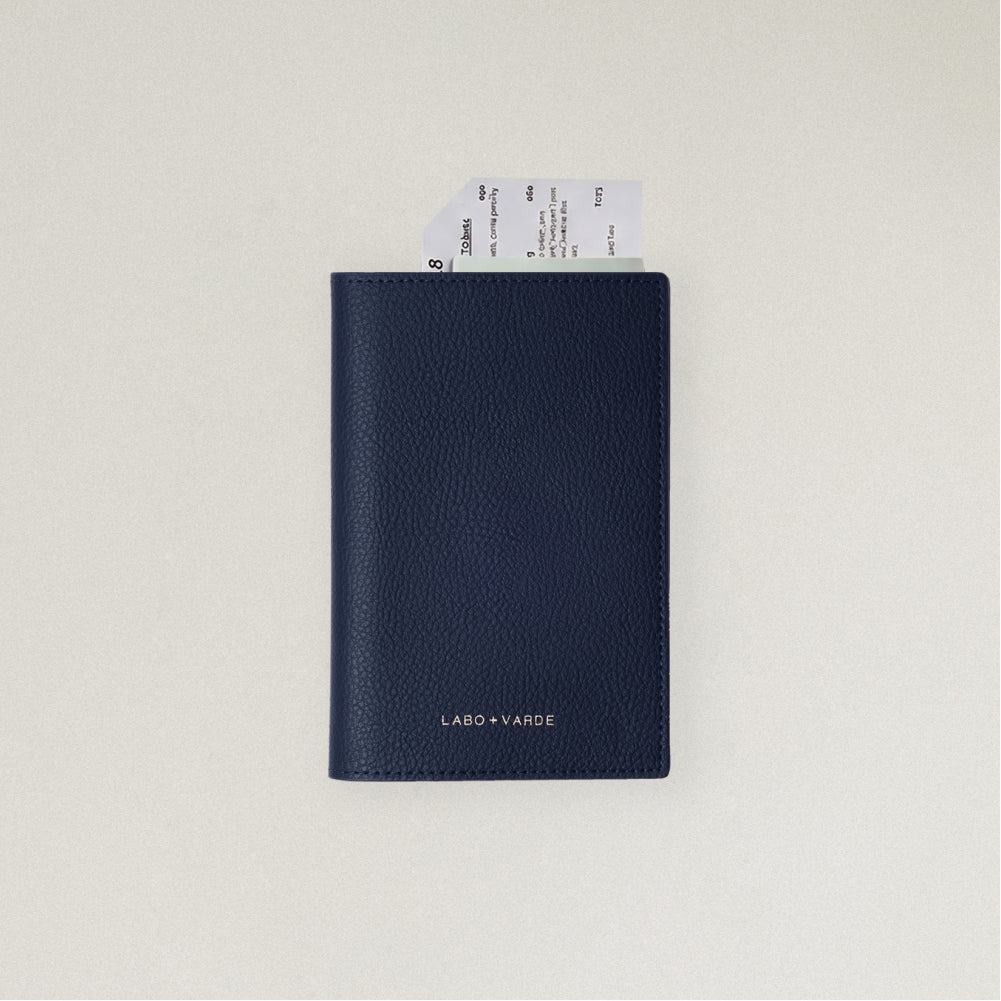 Labovarde Passport Case in Navy — front view showing passport cover and Tickets in Case on a white Background