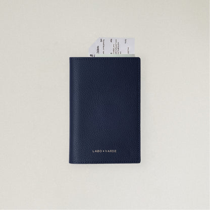 Labovarde Passport Case in Navy — front view showing passport cover and Tickets in Case on a white Background