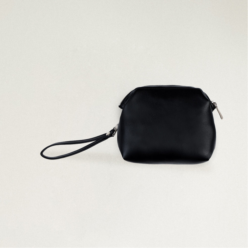 Labovarde Shell Pouch Bag in Black — Clean front view highlighting the top zipper closure and convenient wristlet strap.