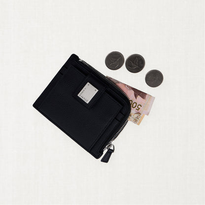 Labovarde Zipper Card Wallet in Black — Flat lay view of the open zipper card wallet with bill and coins