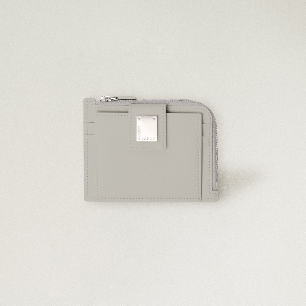 Labovarde Zipper Card Wallet in Light Gray— Front view highlighting the signature silver metal plate and zipper closure