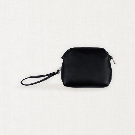 Labovarde Shell Pouch Bag in Black — Clean front view highlighting the top zipper closure and convenient wristlet strap.